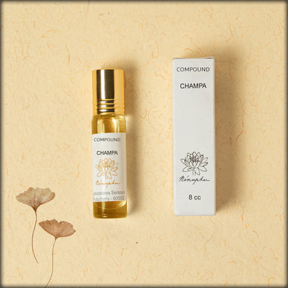 online shopping Champa roll-on perfume oil with a rich floral aroma, alcohol-free natural attar, long-lasting fragrance oil for daily wear from sri aurobindo ashram available in aura store puducherry