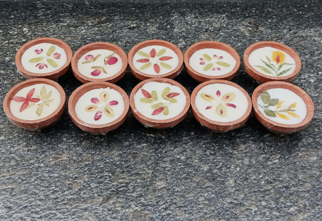 online-shopping-set-of-10-perfume-terracotta-candles-in-aura-experience-store-pondicherry