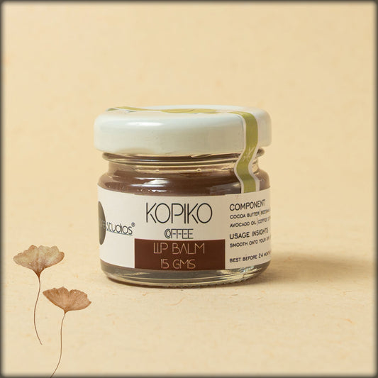 online store kopiko coffee lip balm which is cocoa butter, beeswax, jojoba oil, almond oil, avocado oil and coffee extract, which will enhance your dry lip from aura, a unit of Aurosercive Trust, puducherry