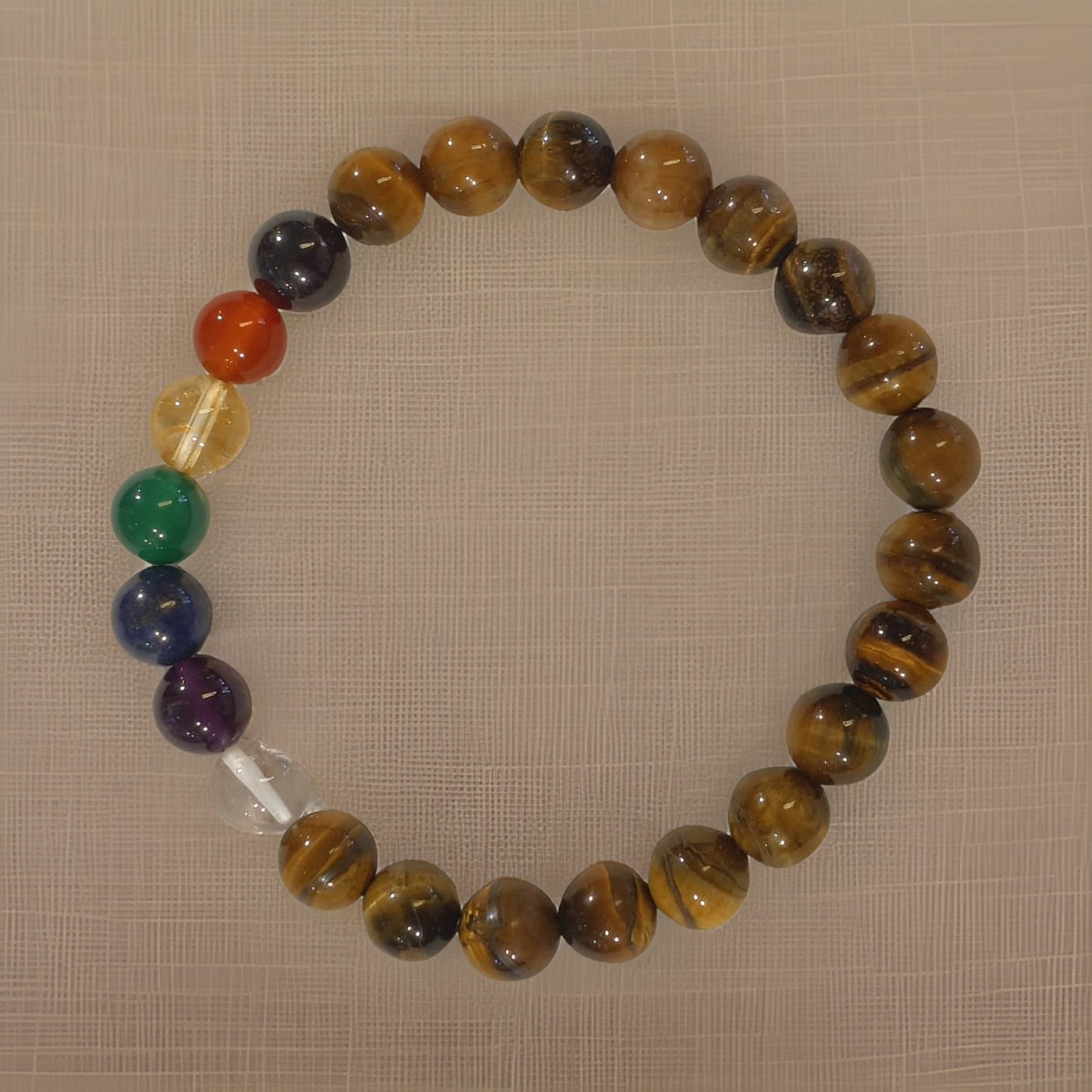 tiger eye unisex bracelet with 7 chakra gemstones for energy balance handcrafted in auroville