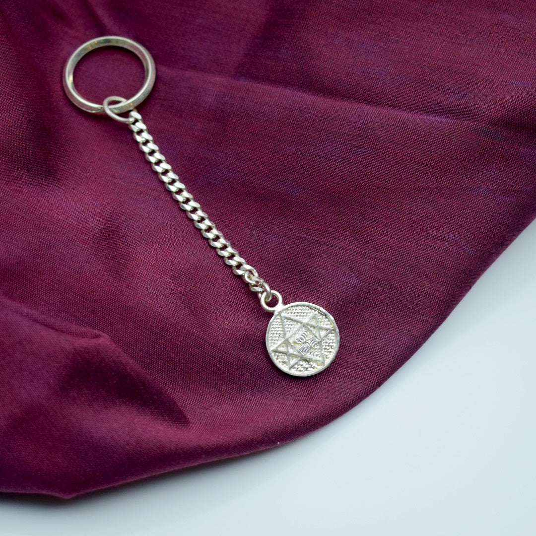 shop sri aurobindo symbol silver key chain of sri aurobindo ashram pondicherry marketed by aura store puducherry