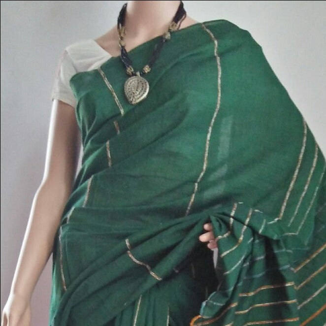 handloom khesh saree draped over a mannequin