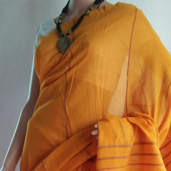 breathable-cotton-mannequin-wearing-a-fuel-yellow-color-khesh-saree-easy-to-wear-in-aura-store-ppondicherry