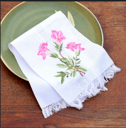 hand-towel-with-a-cross-stitch-flower-design-in-white